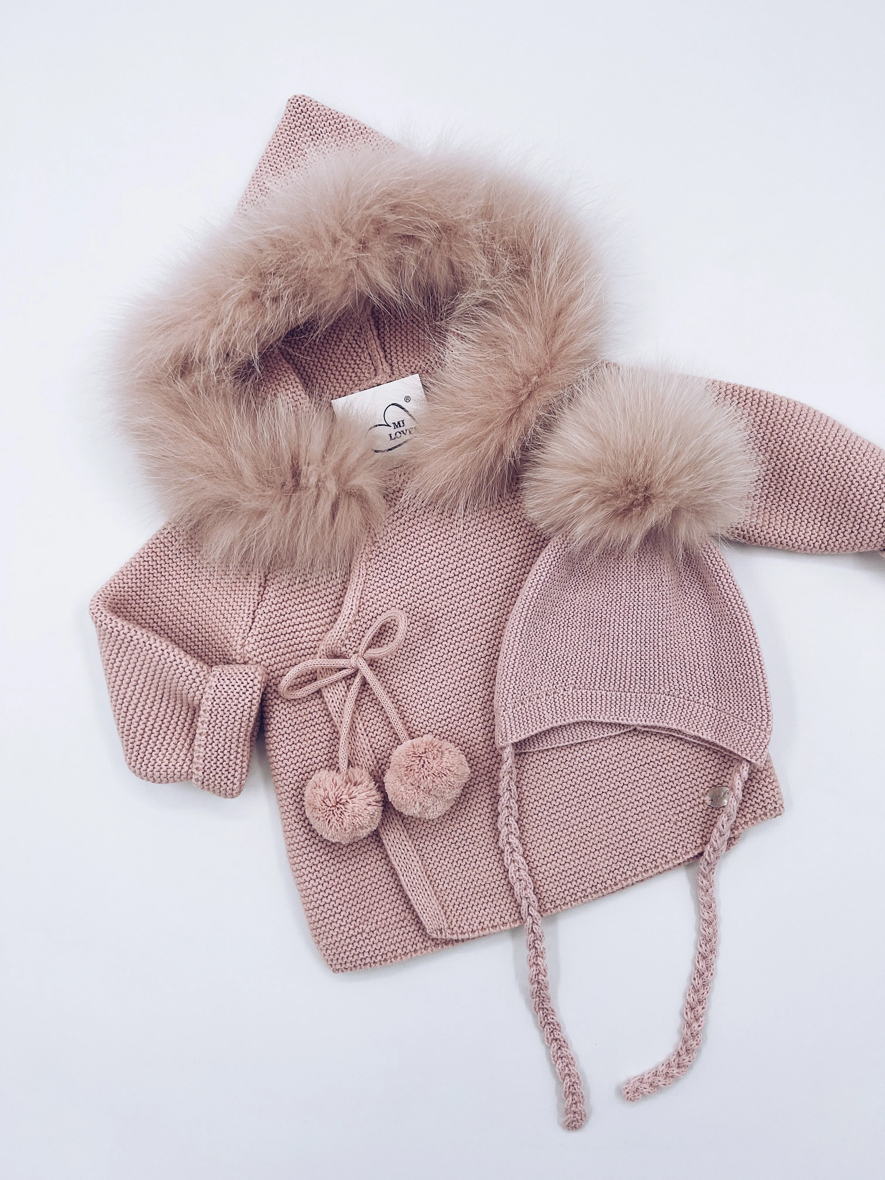 Beautiful Pink knitted Cardigan with Luxurious fur trim.