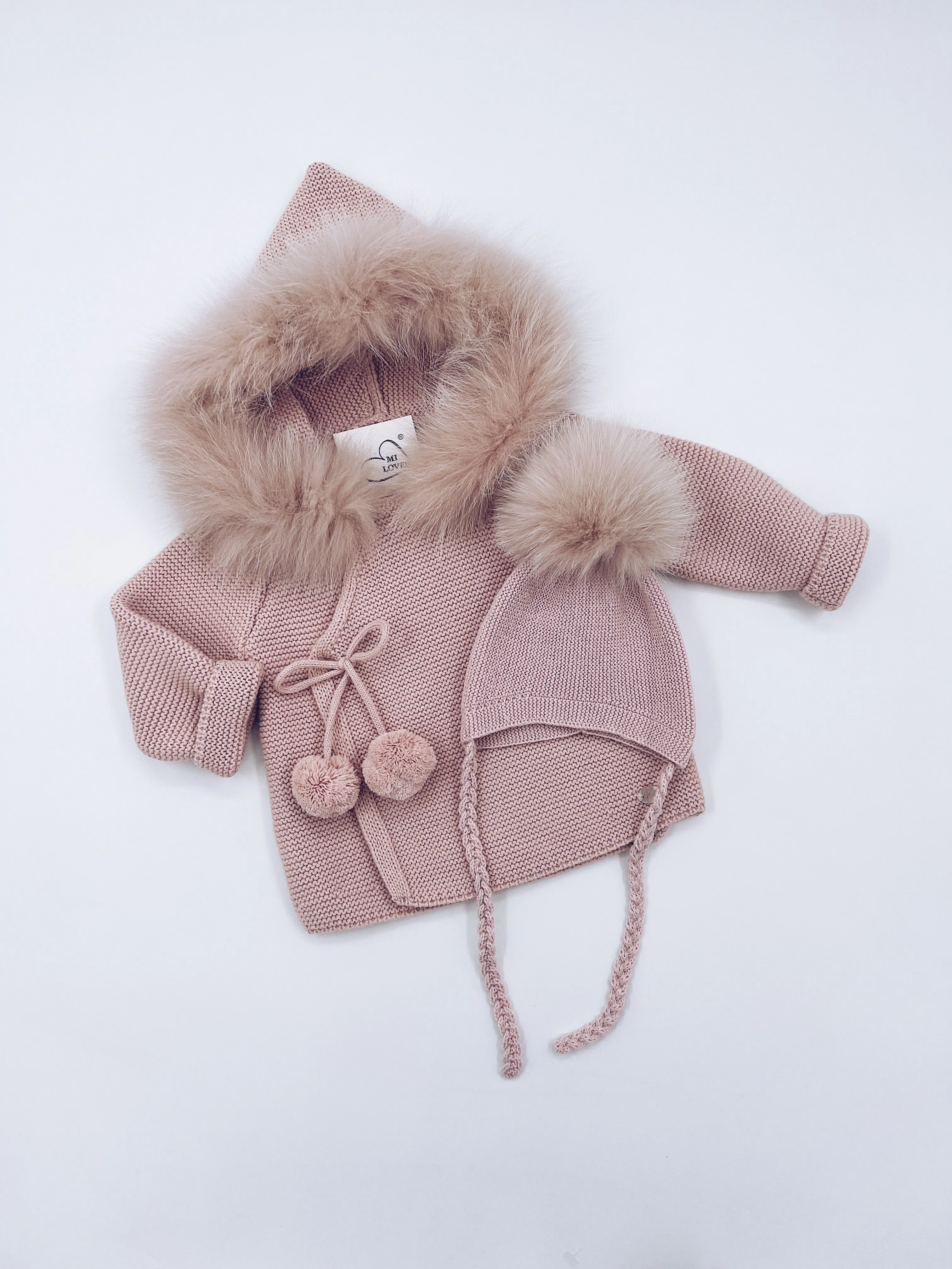 Beautiful Pink knitted Cardigan with Luxurious fur trim.