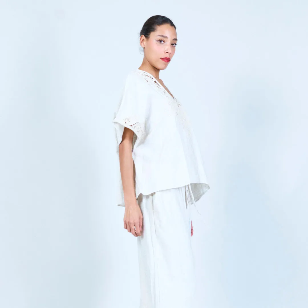 Embroidered V-neck blouse with lace details wholesale