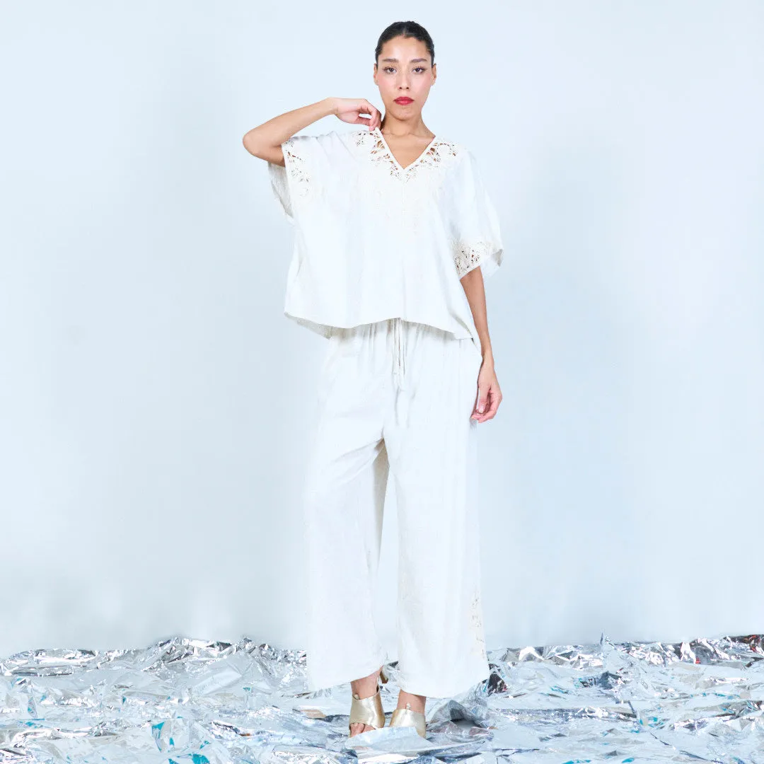 Embroidered V-neck blouse with lace details wholesale