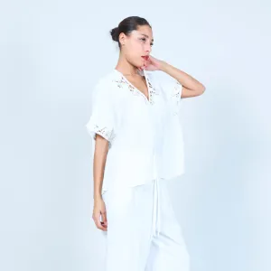 Embroidered V-neck blouse with lace details wholesale