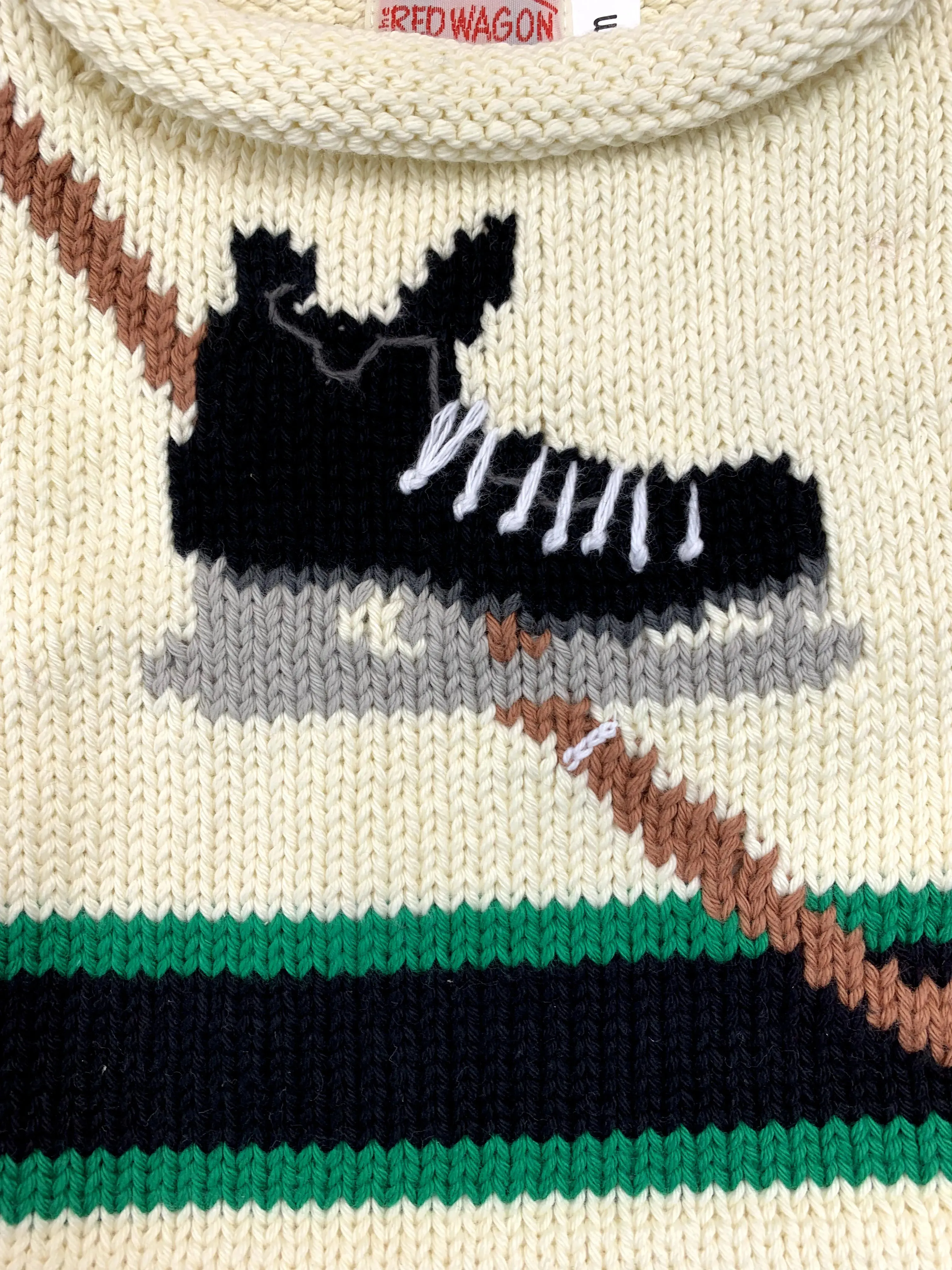 Ivory Kelly Green and Black Hockey Skate Roll Neck Sweater