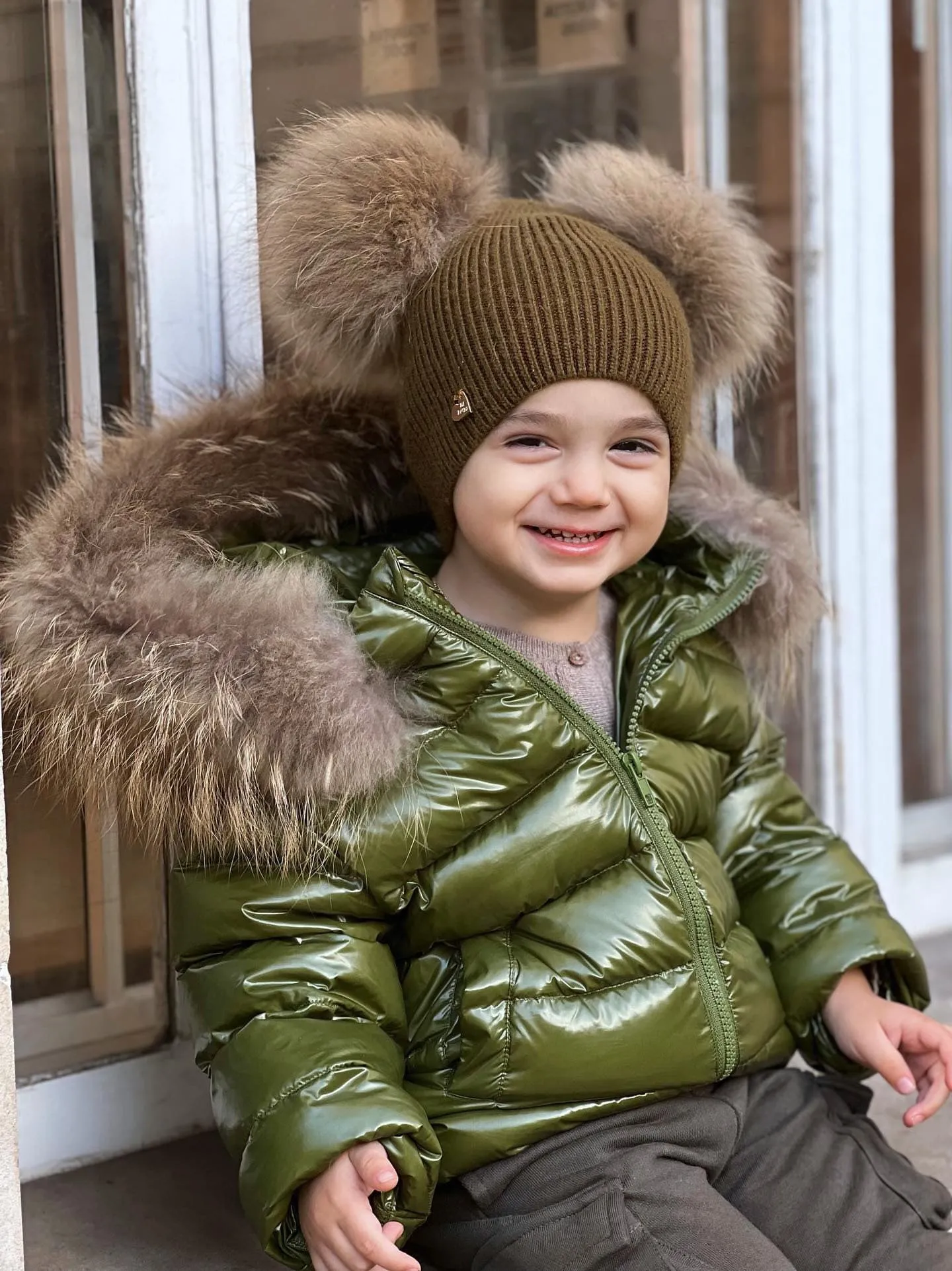 KIDS MI LOVES SIGNATURE Luxurious Racoon Fur Trim puff jacket in Khaki green colour.