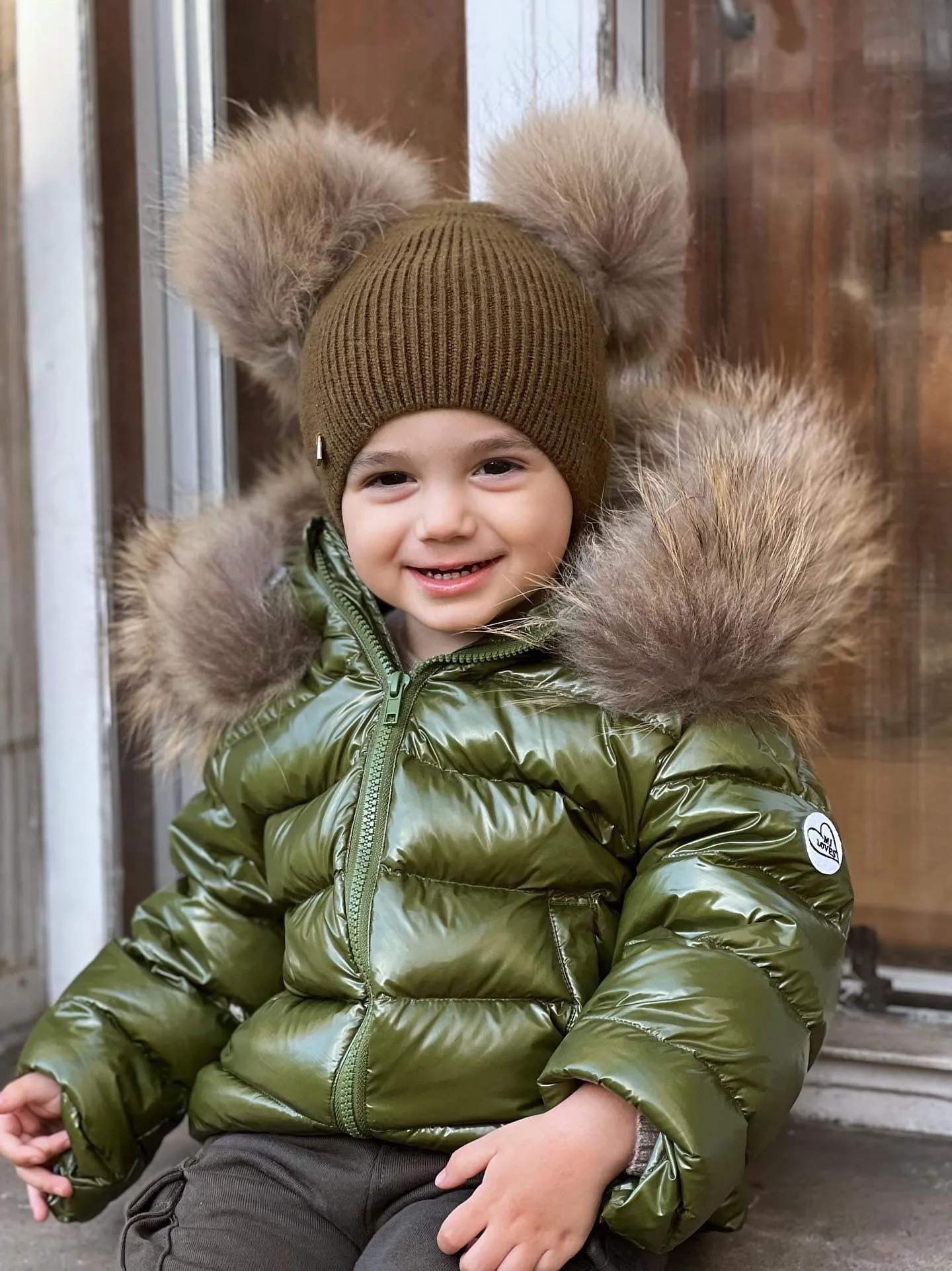 KIDS MI LOVES SIGNATURE Luxurious Racoon Fur Trim puff jacket in Khaki green colour.