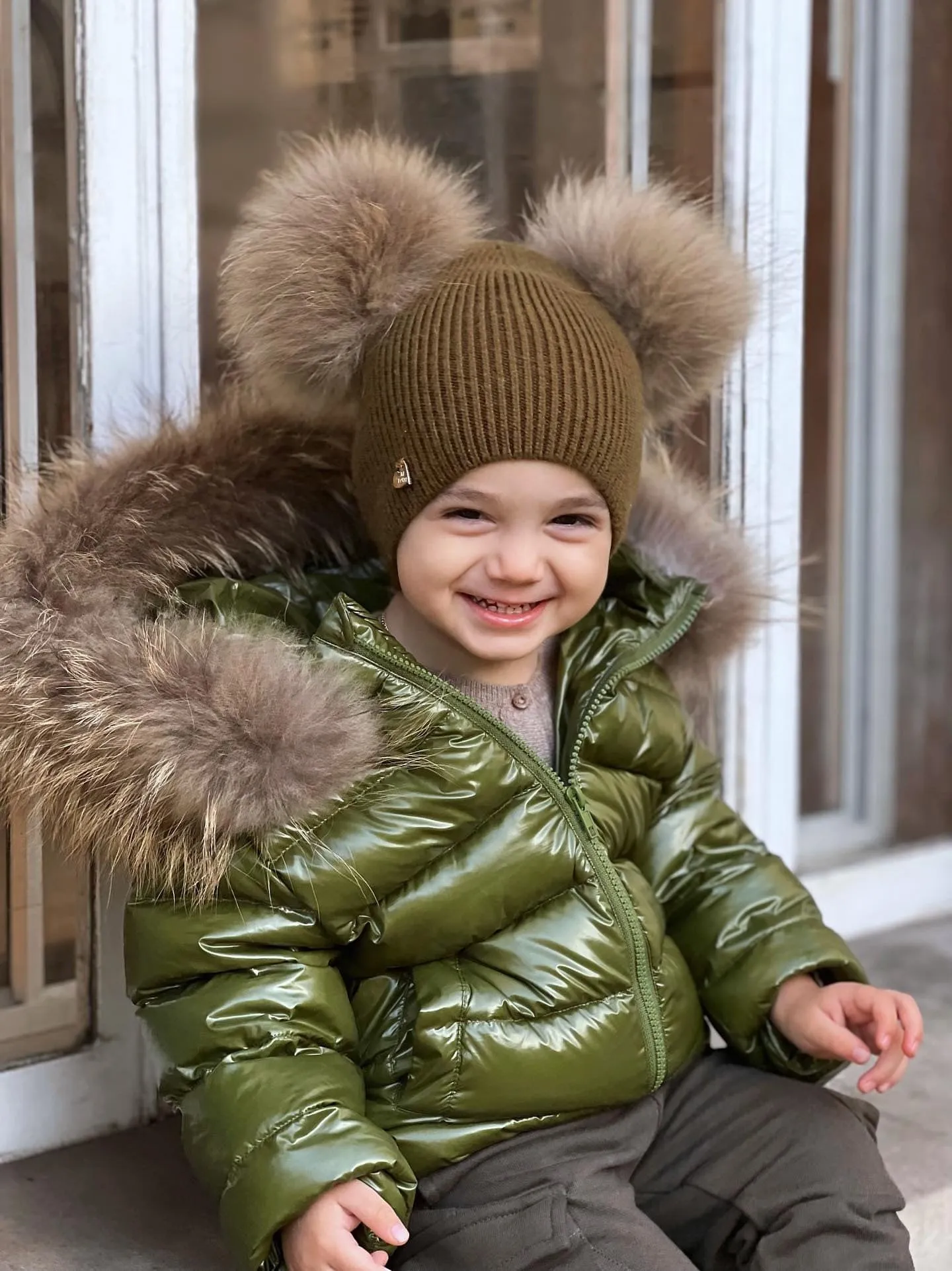 KIDS MI LOVES SIGNATURE Luxurious Racoon Fur Trim puff jacket in Khaki green colour.