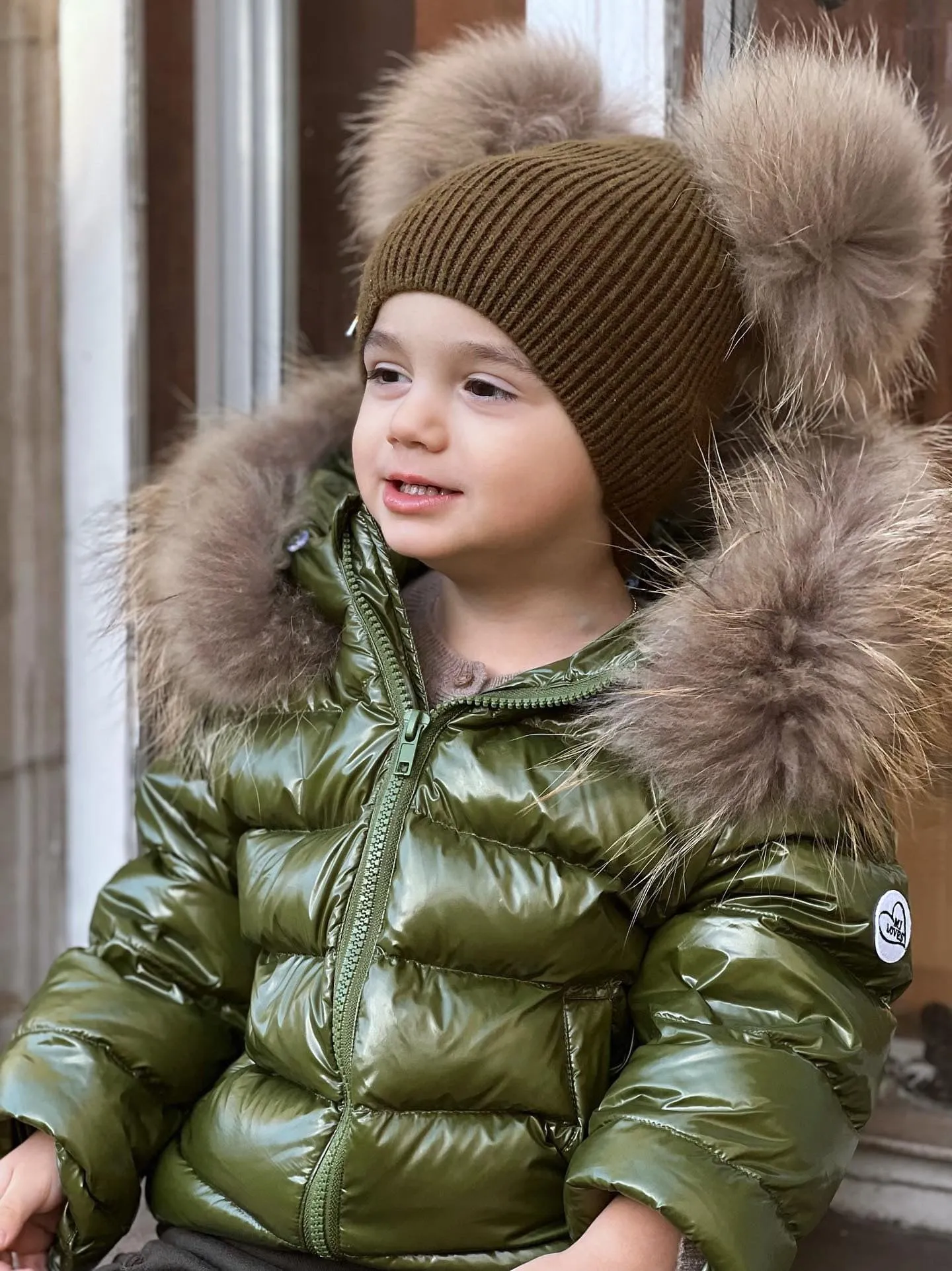 KIDS MI LOVES SIGNATURE Luxurious Racoon Fur Trim puff jacket in Khaki green colour.