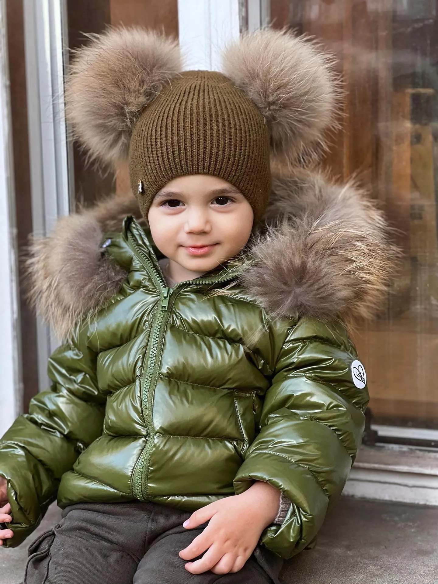 KIDS MI LOVES SIGNATURE Luxurious Racoon Fur Trim puff jacket in Khaki green colour.