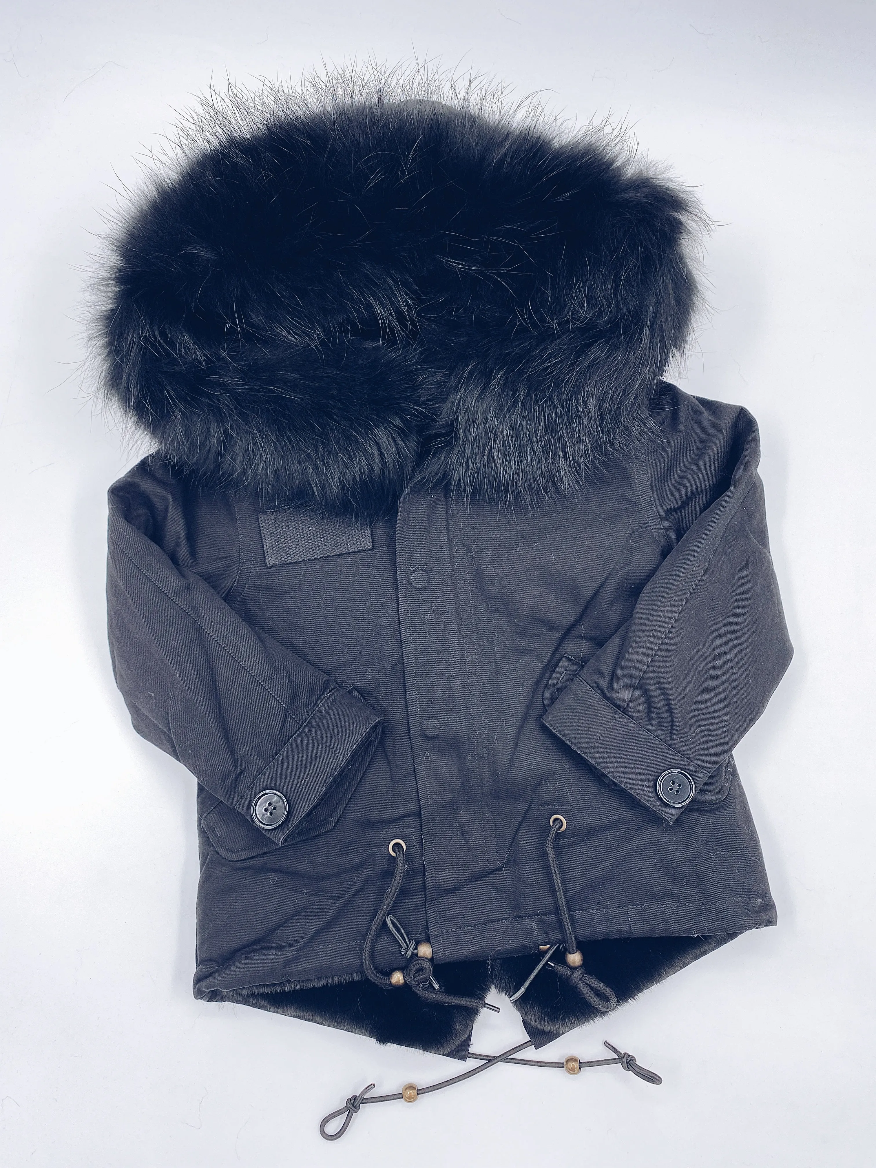 MI LOVES SIGNATURE Black parka jacket with Luxurious Black Racoon fur trim.