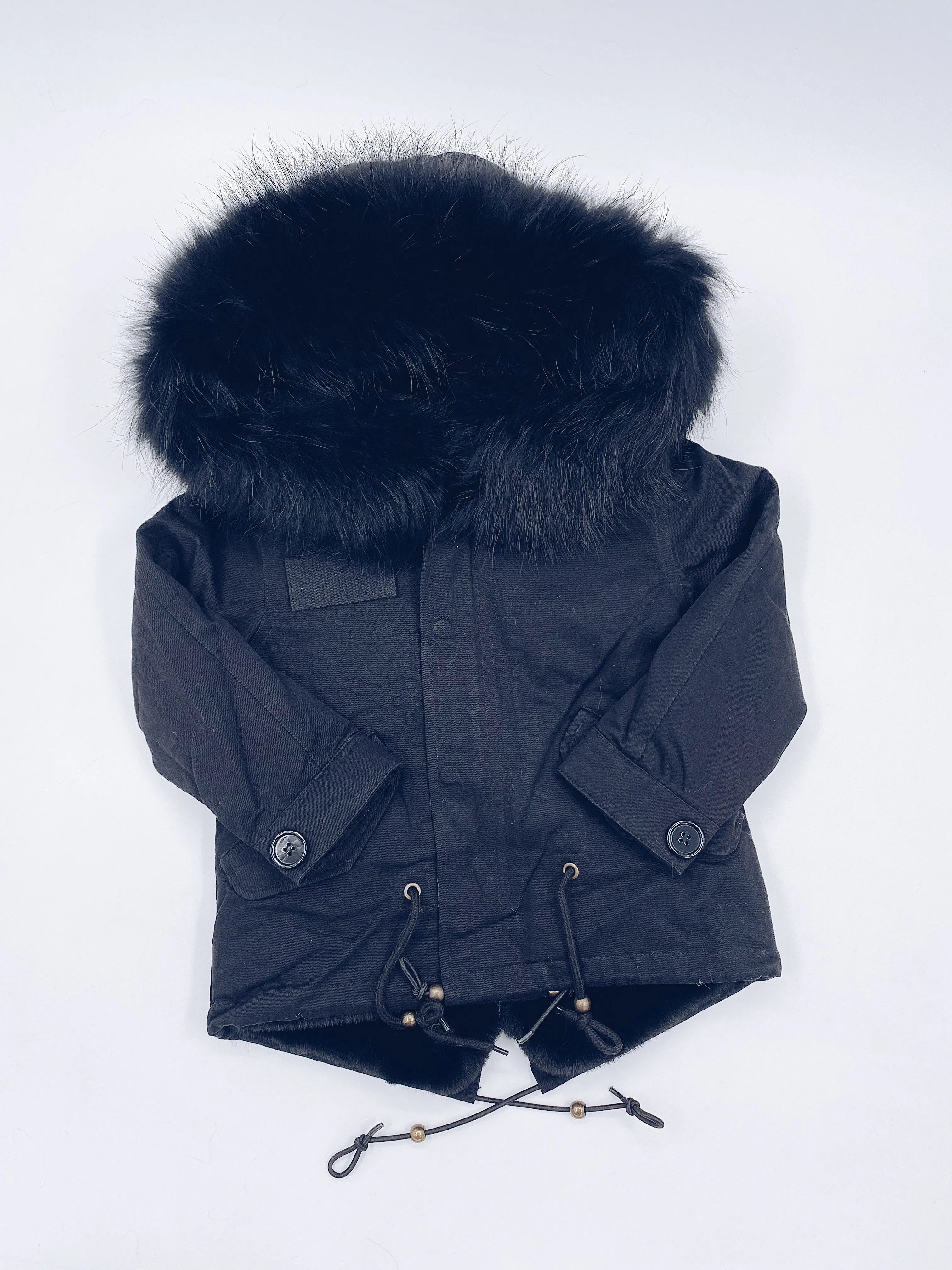 MI LOVES SIGNATURE Black parka jacket with Luxurious Black Racoon fur trim.