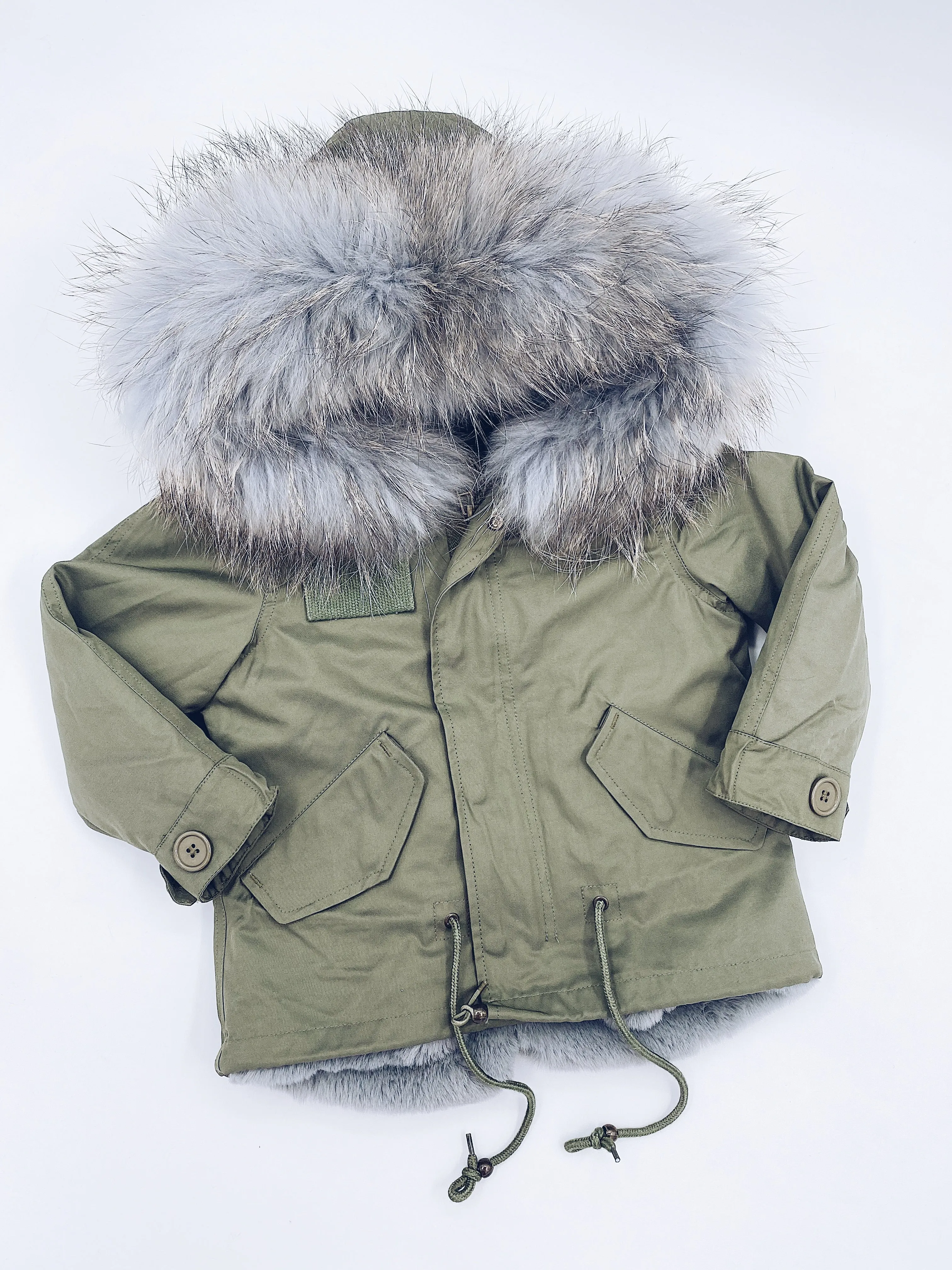 MI LOVES SIGNATURE Khaki Green parka jacket with Luxurious Grey Racoon fur trim.