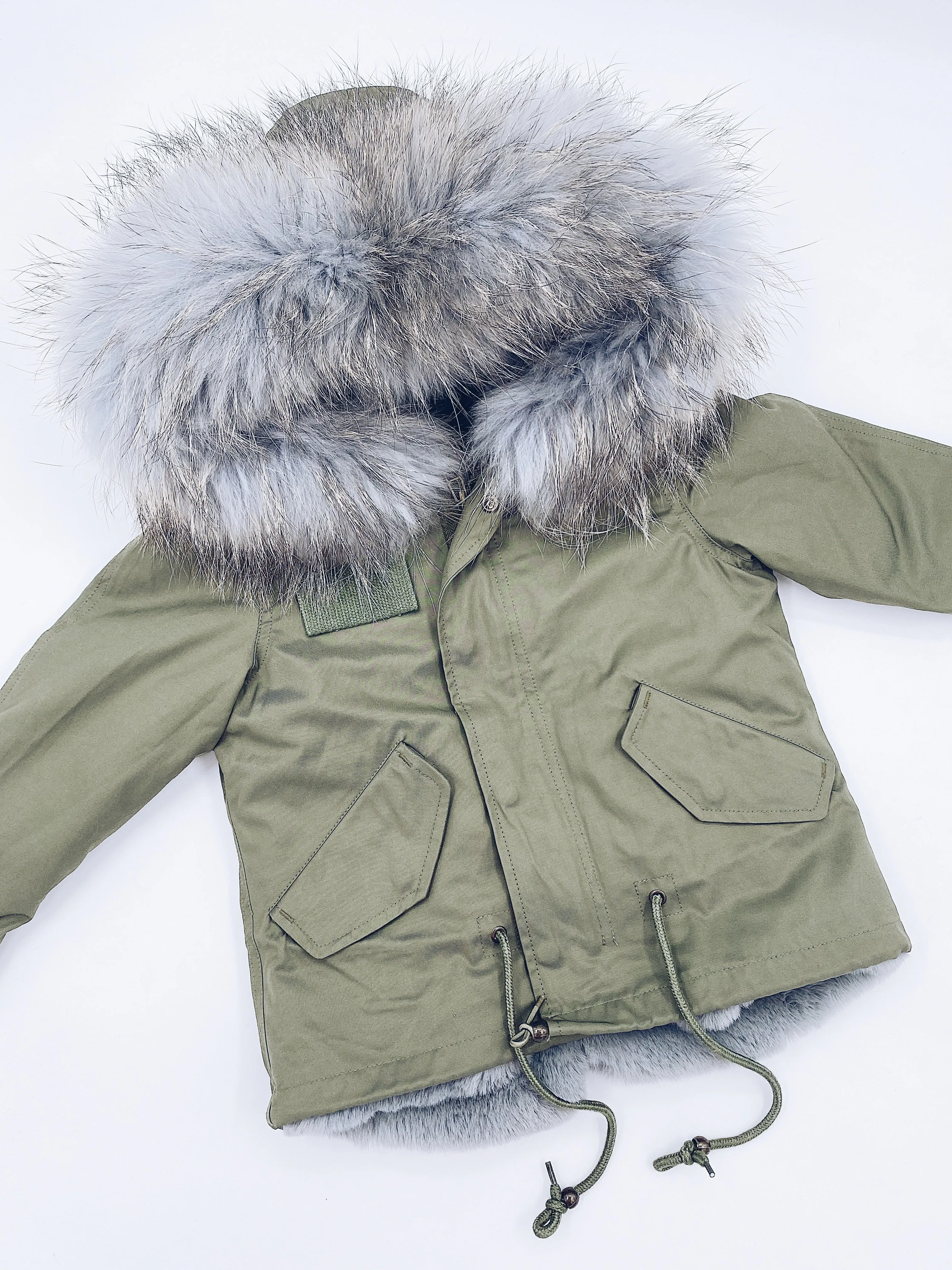 MI LOVES SIGNATURE Khaki Green parka jacket with Luxurious Grey Racoon fur trim.
