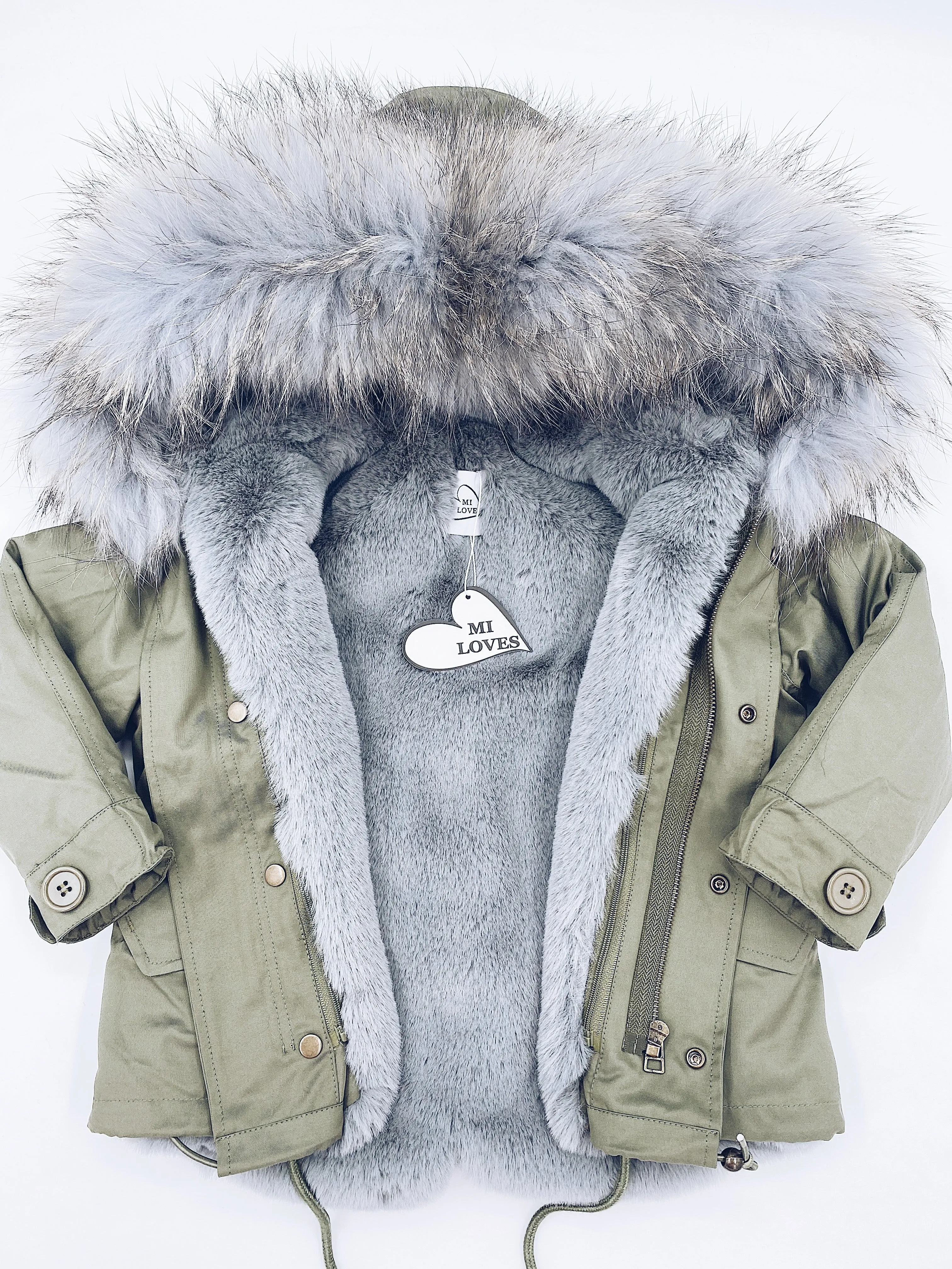 MI LOVES SIGNATURE Khaki Green parka jacket with Luxurious Grey Racoon fur trim.