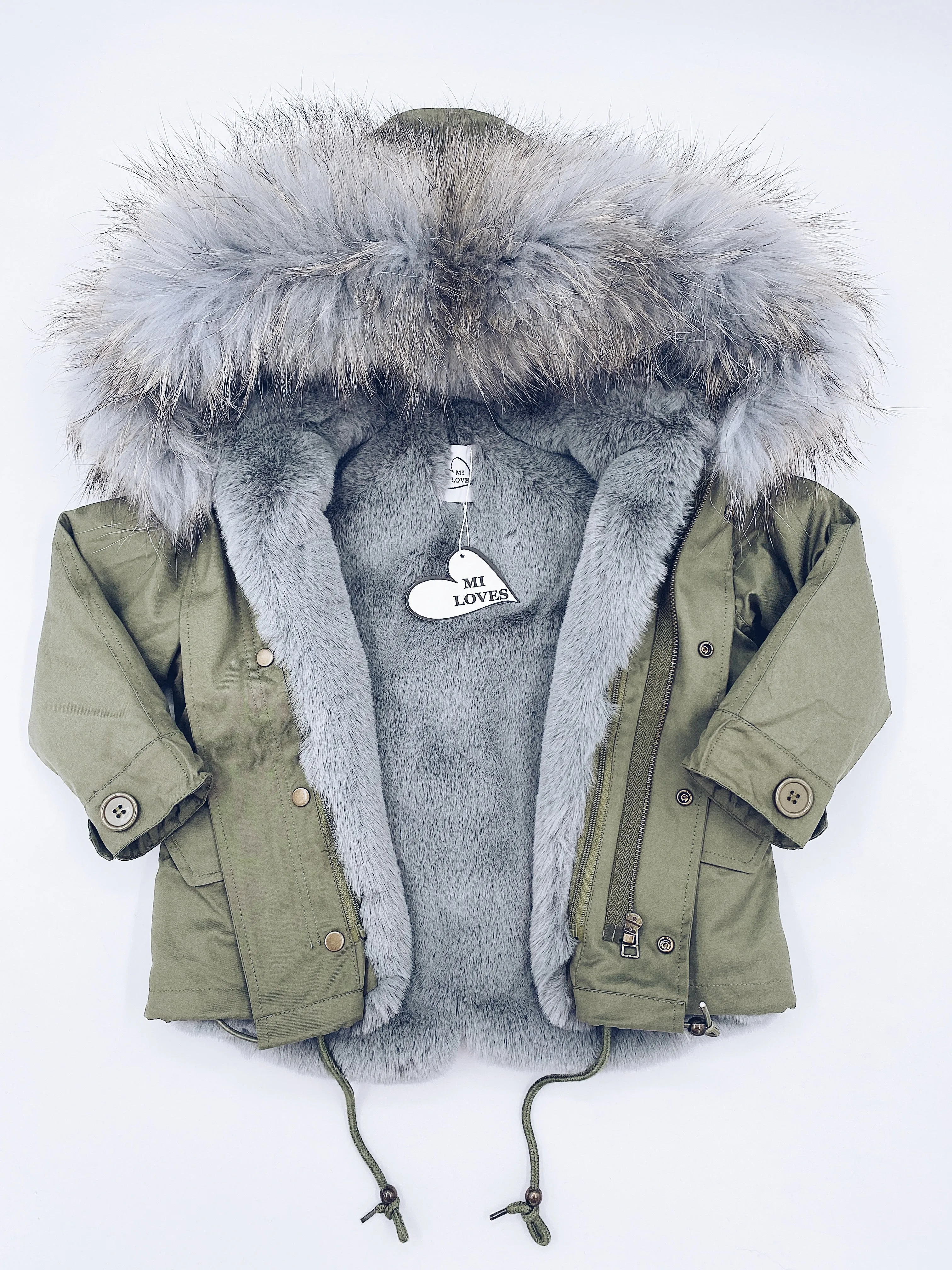 MI LOVES SIGNATURE Khaki Green parka jacket with Luxurious Grey Racoon fur trim.