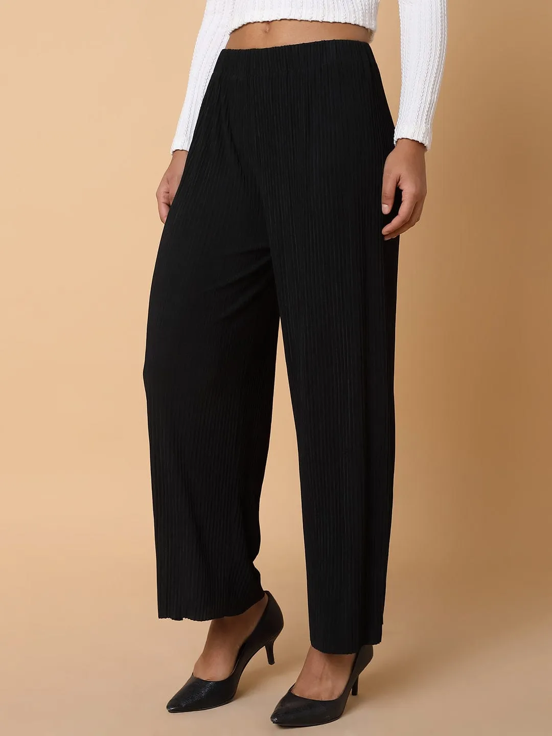 Women Black Comfort Mid-Rise Flared Trousers