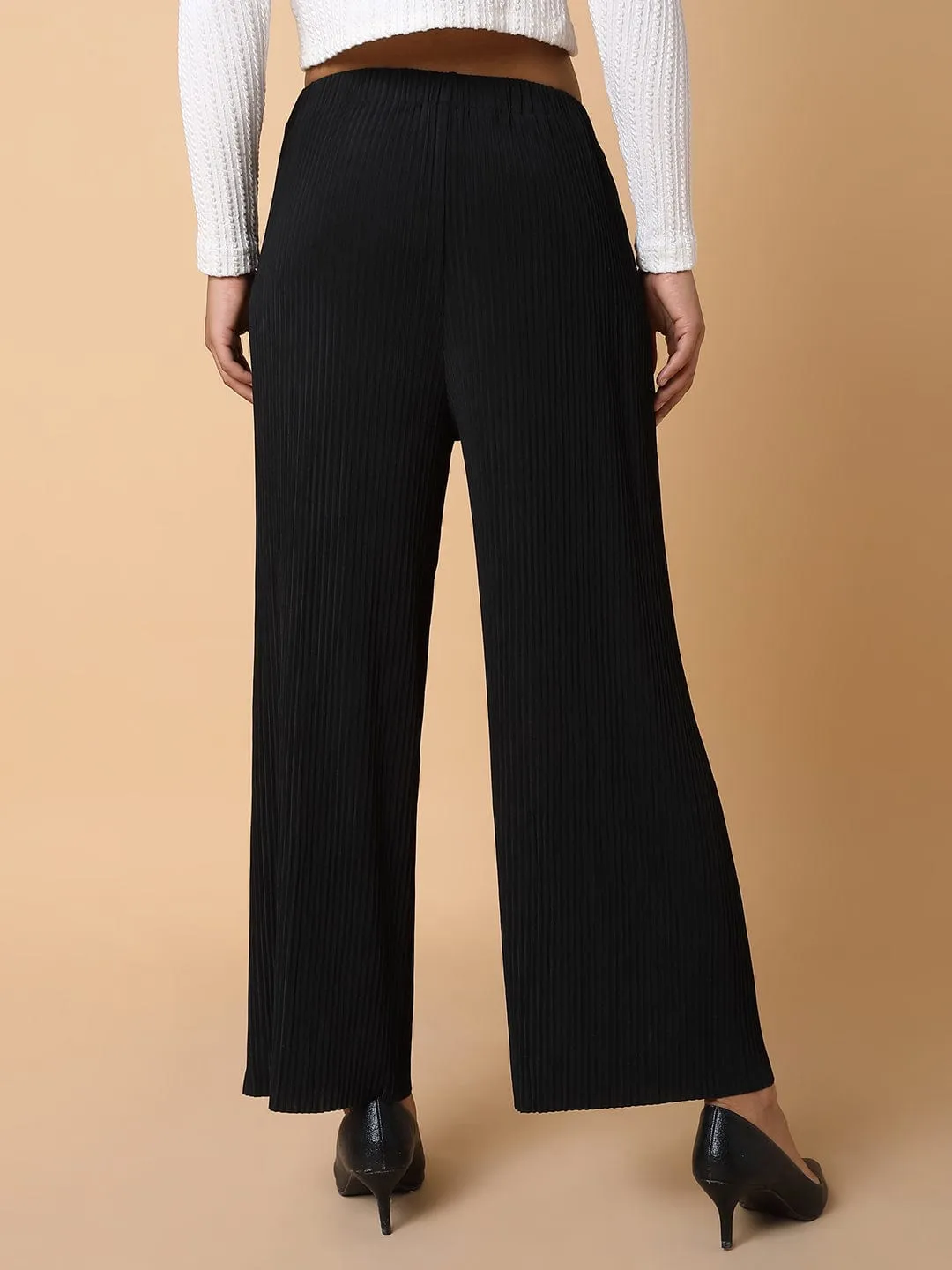 Women Black Comfort Mid-Rise Flared Trousers