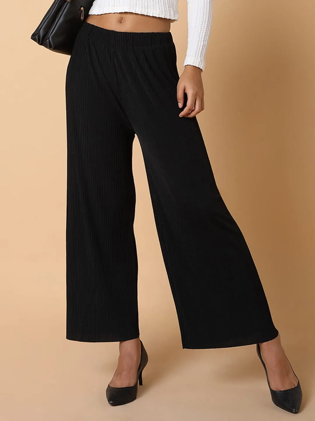 Women Black Comfort Mid-Rise Flared Trousers