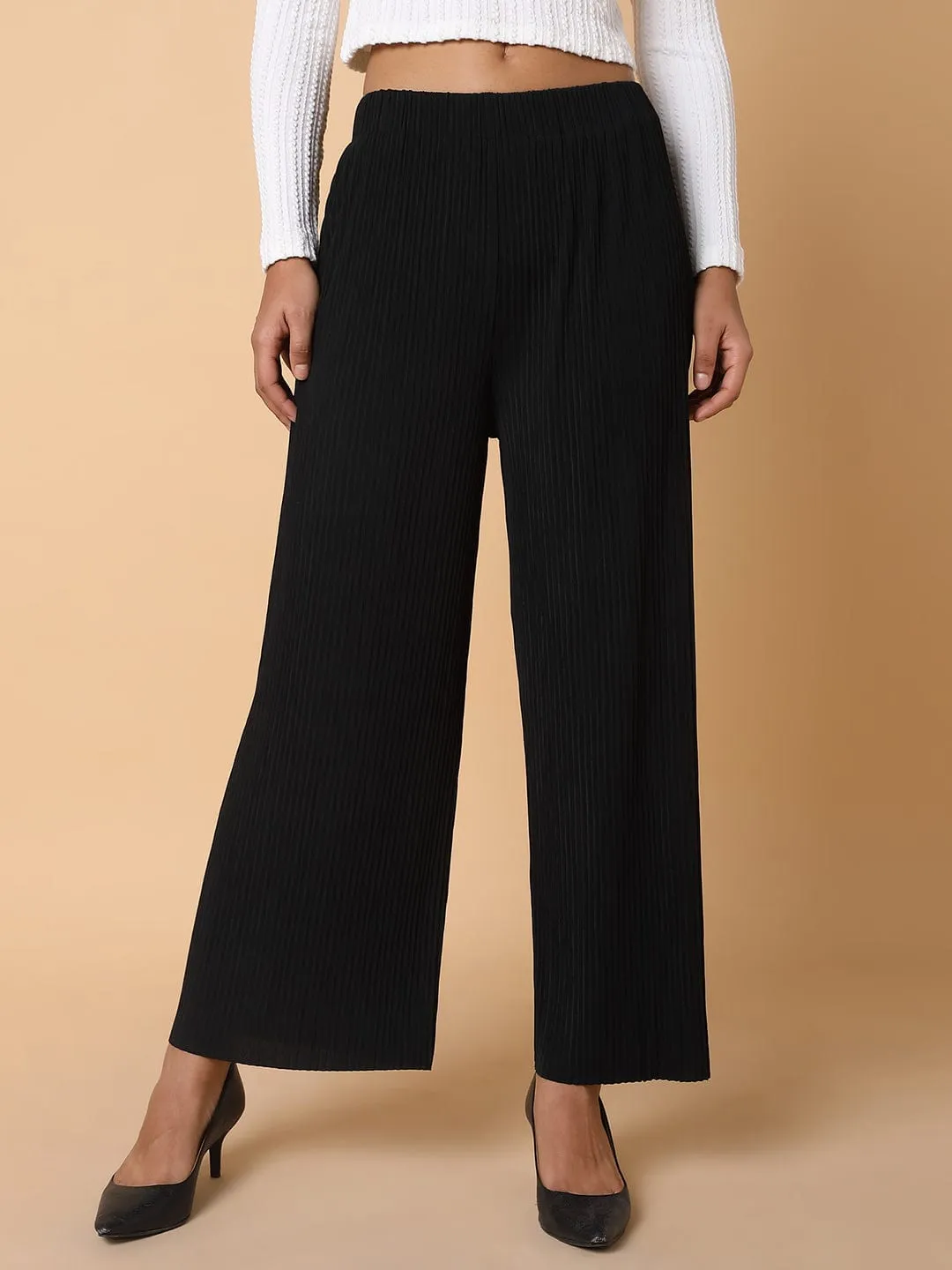 Women Black Comfort Mid-Rise Flared Trousers
